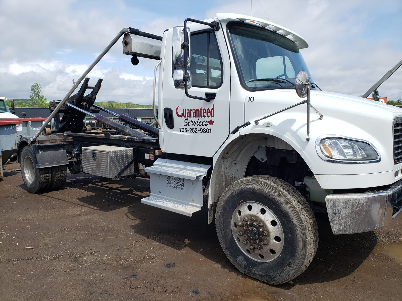 White truck Construction bins